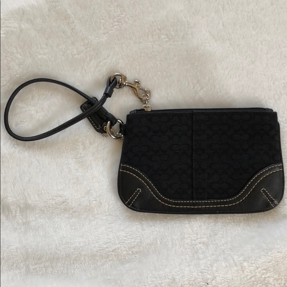 Previously loved black leather Coach wristlet